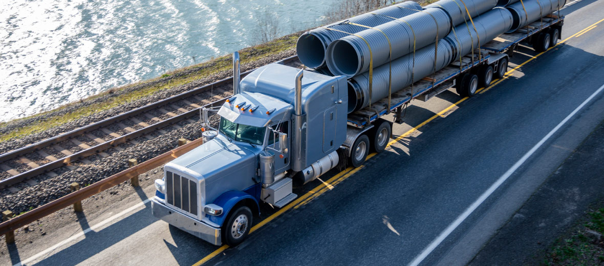 A photo of a semi-truck transporting goods.