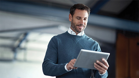 person looking at a tablet