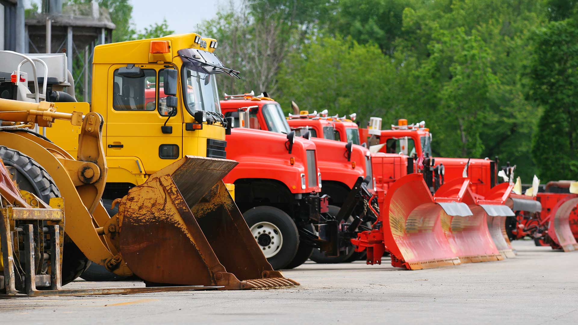 Multiple public works fleets parked next to each other