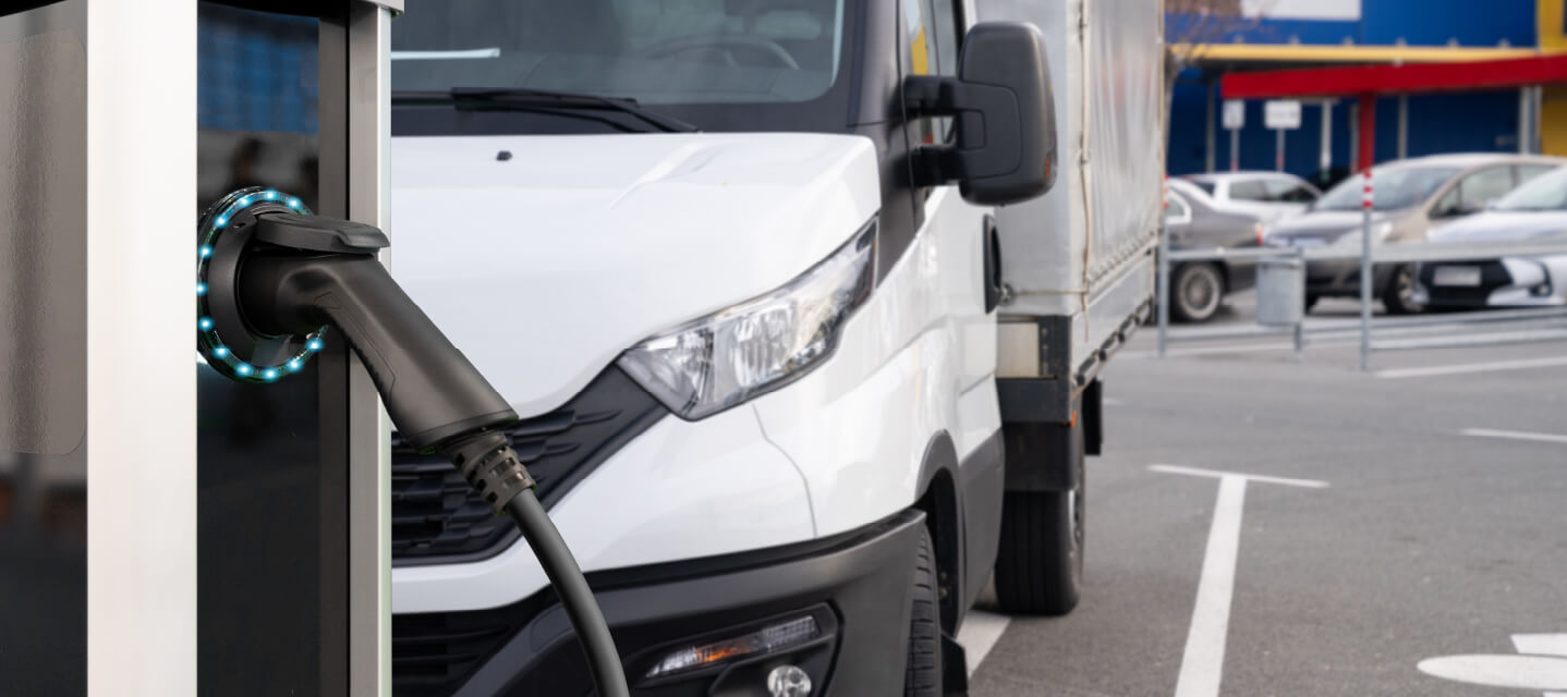 A photo of multiple fleet EV vehicles charging