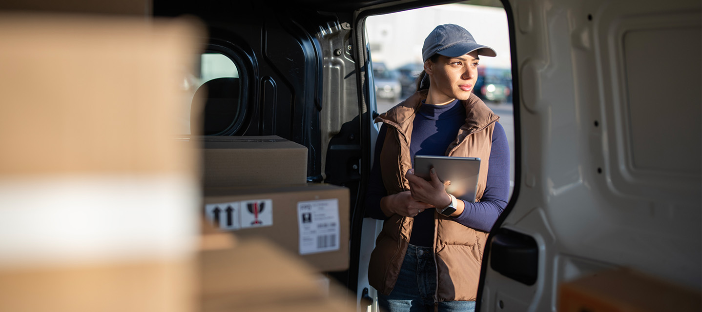 person loading a delivery van