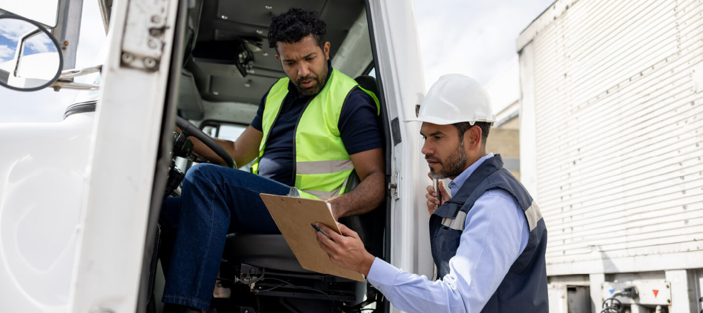 A photo of a person managing multiple fleet vehicles