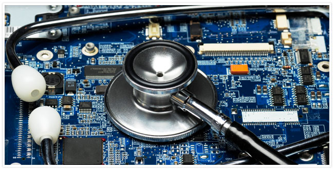A blue circuit board with a stethoscope on it 