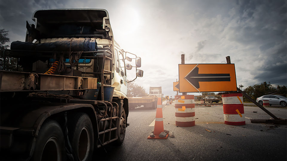 Truck delayed due to road construction.