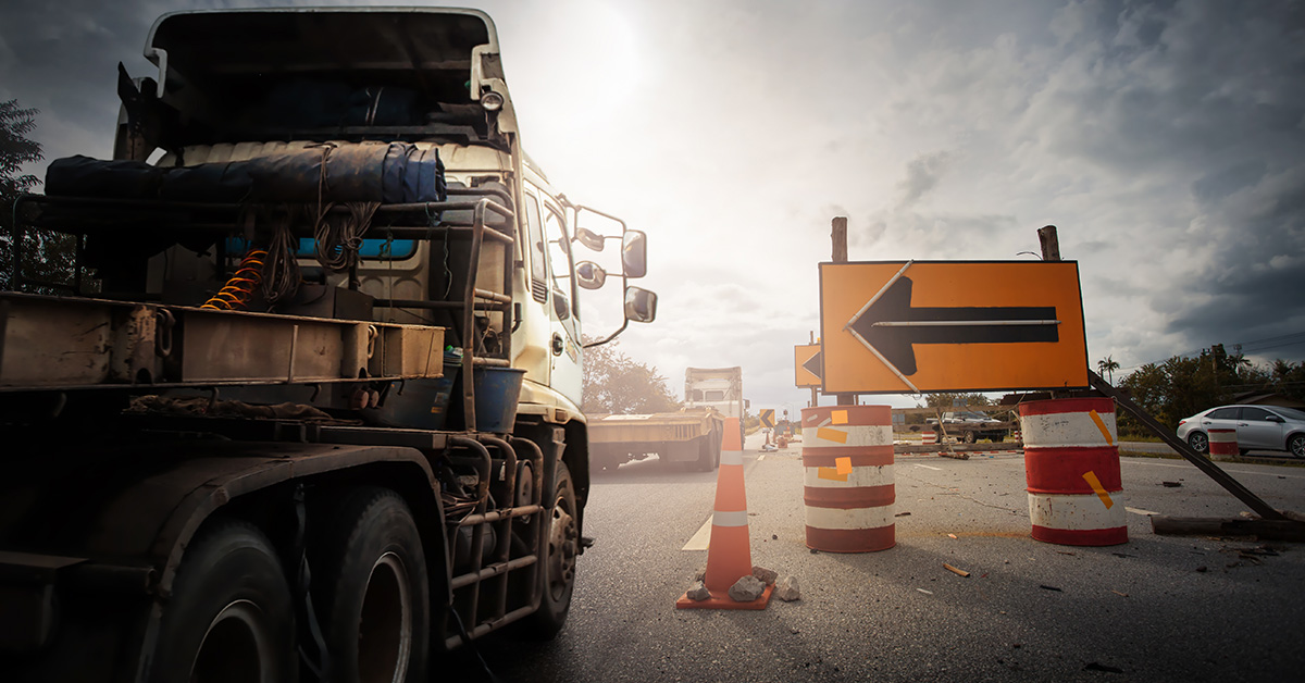 Truck delayed due to road construction.