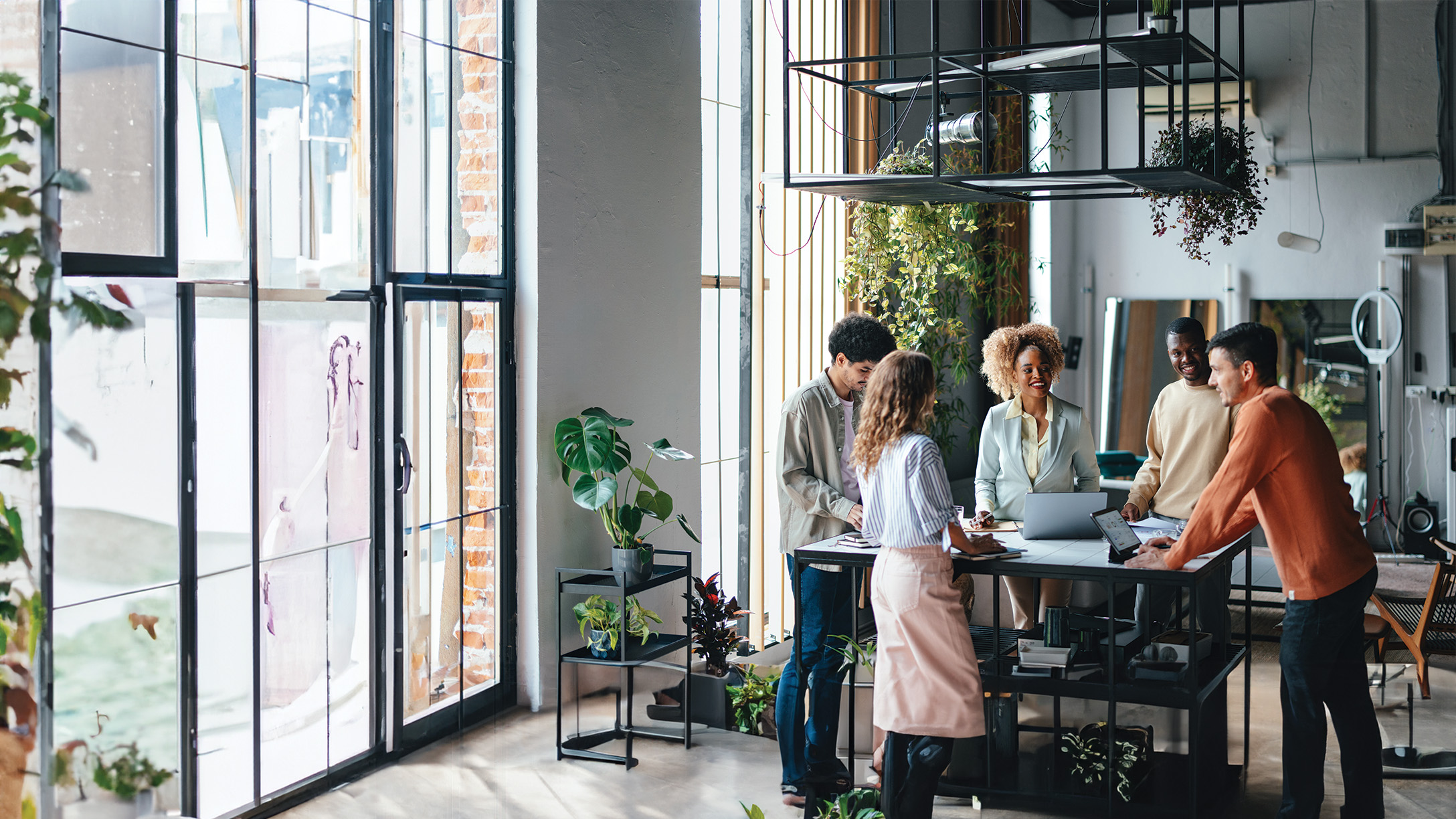 Image of team collaborating at a table