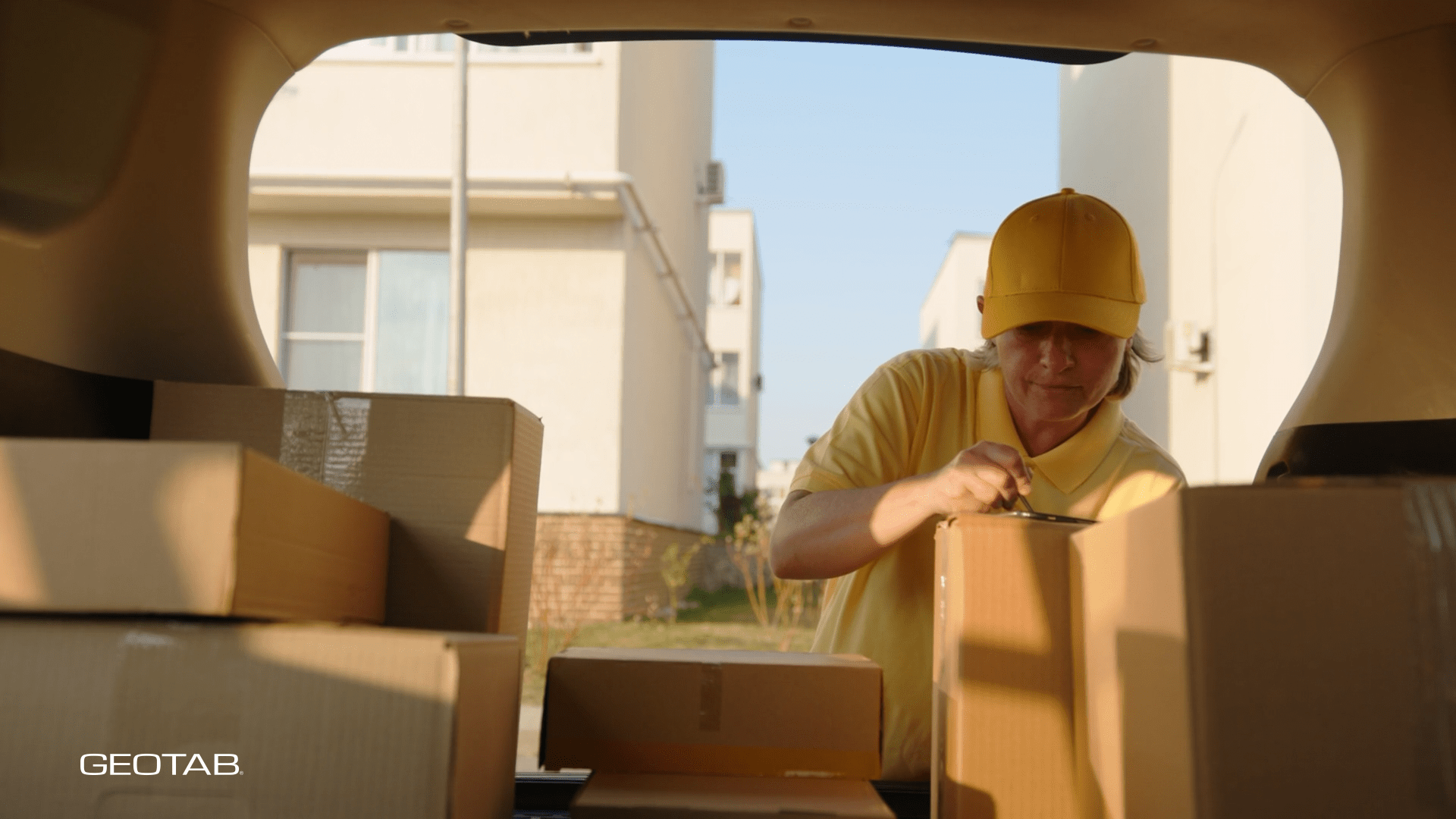 courier driver sorting out packages