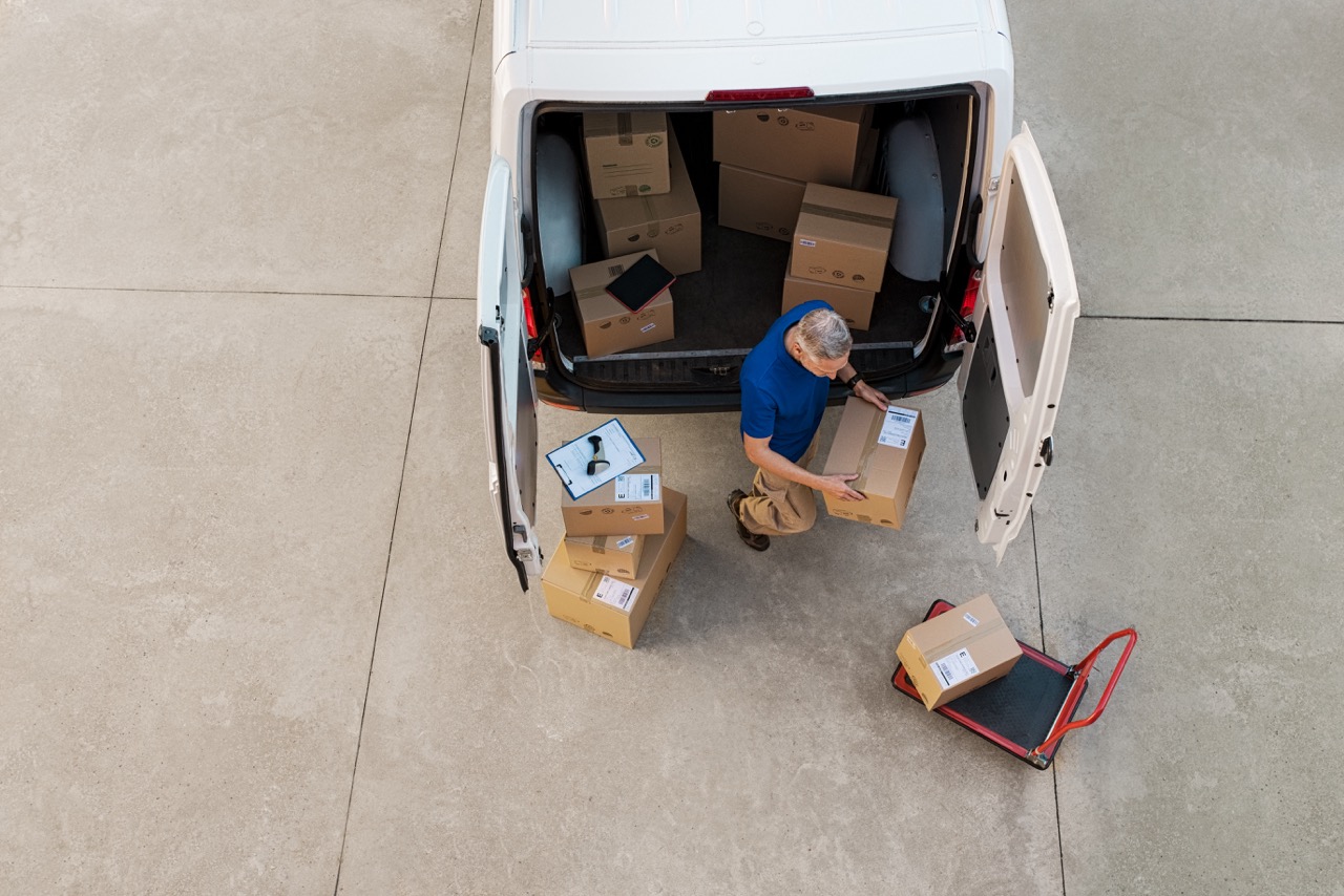 courier driver sorting out packages