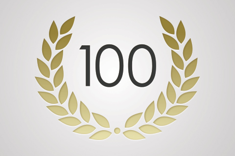 the number 100 in the middle of gold royal greek leaves