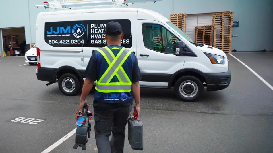 man standing in front of van