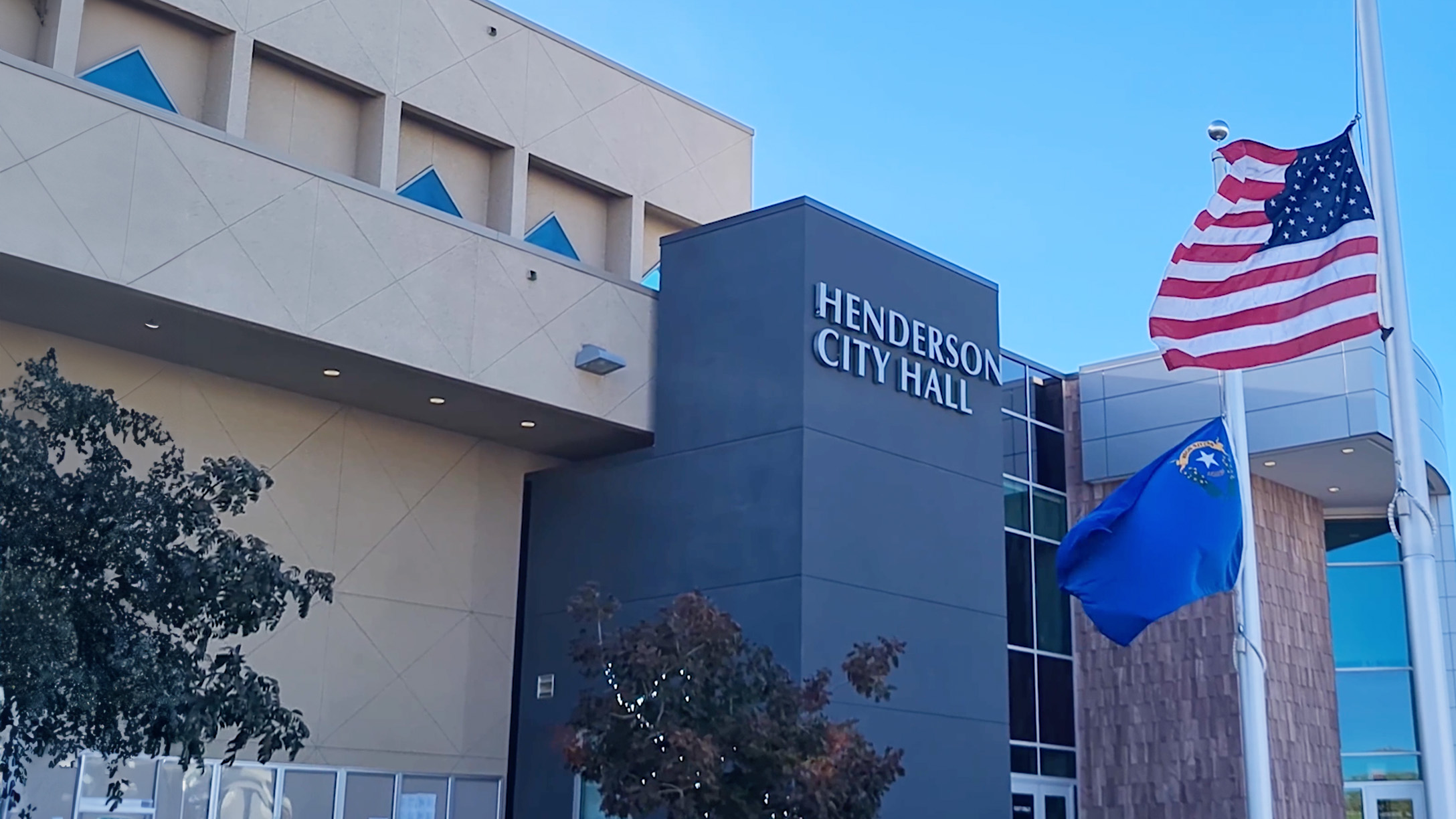 City of Henderson town hall with American flag in front of it