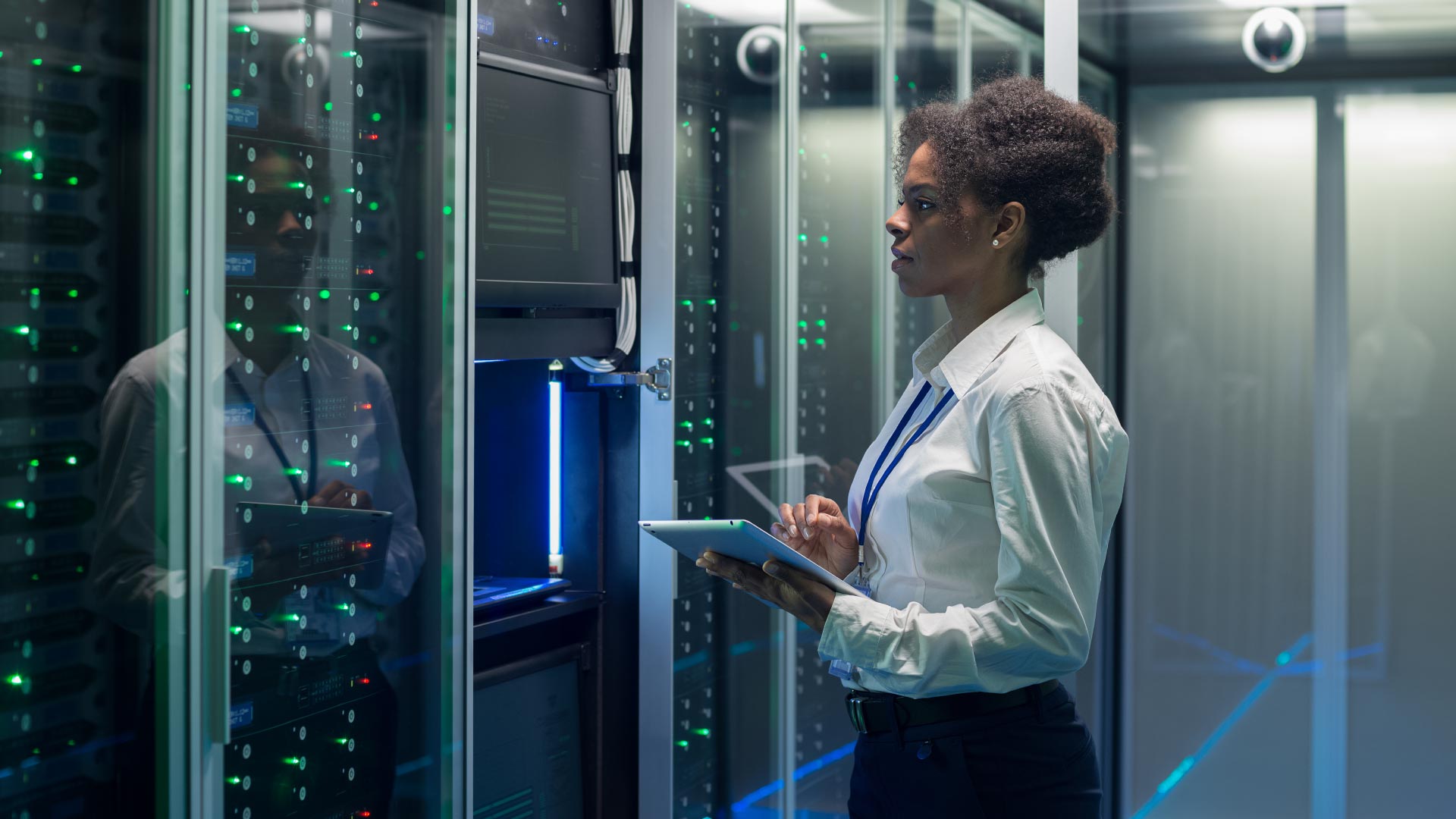 person standing in front of a server 