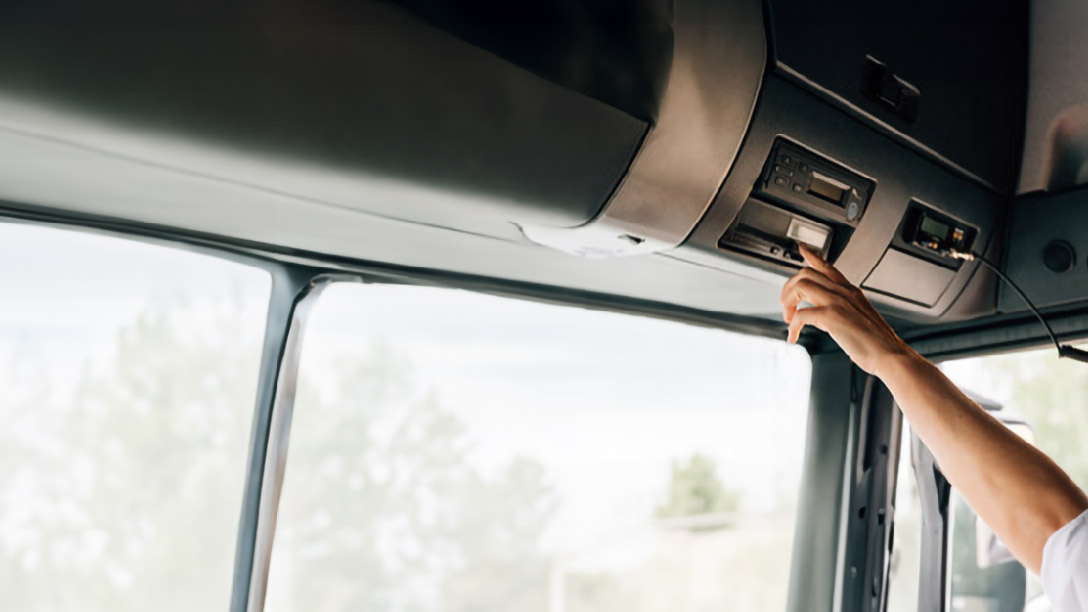 person using a tachograph